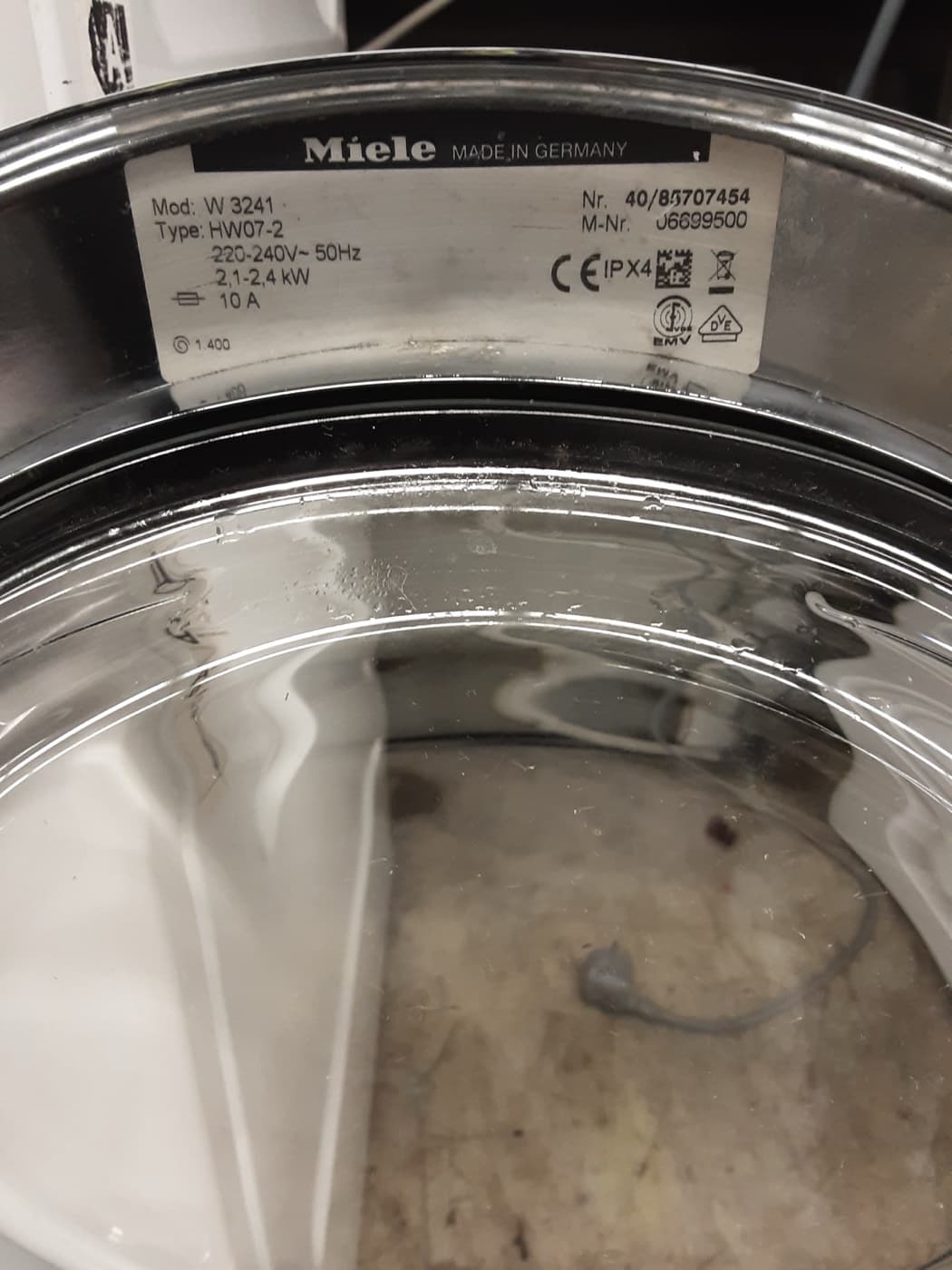 Rating plate on a used washing machine door